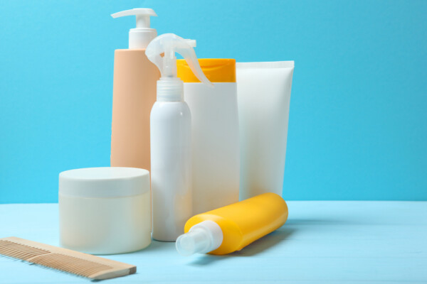 hair care products and a comb on the table